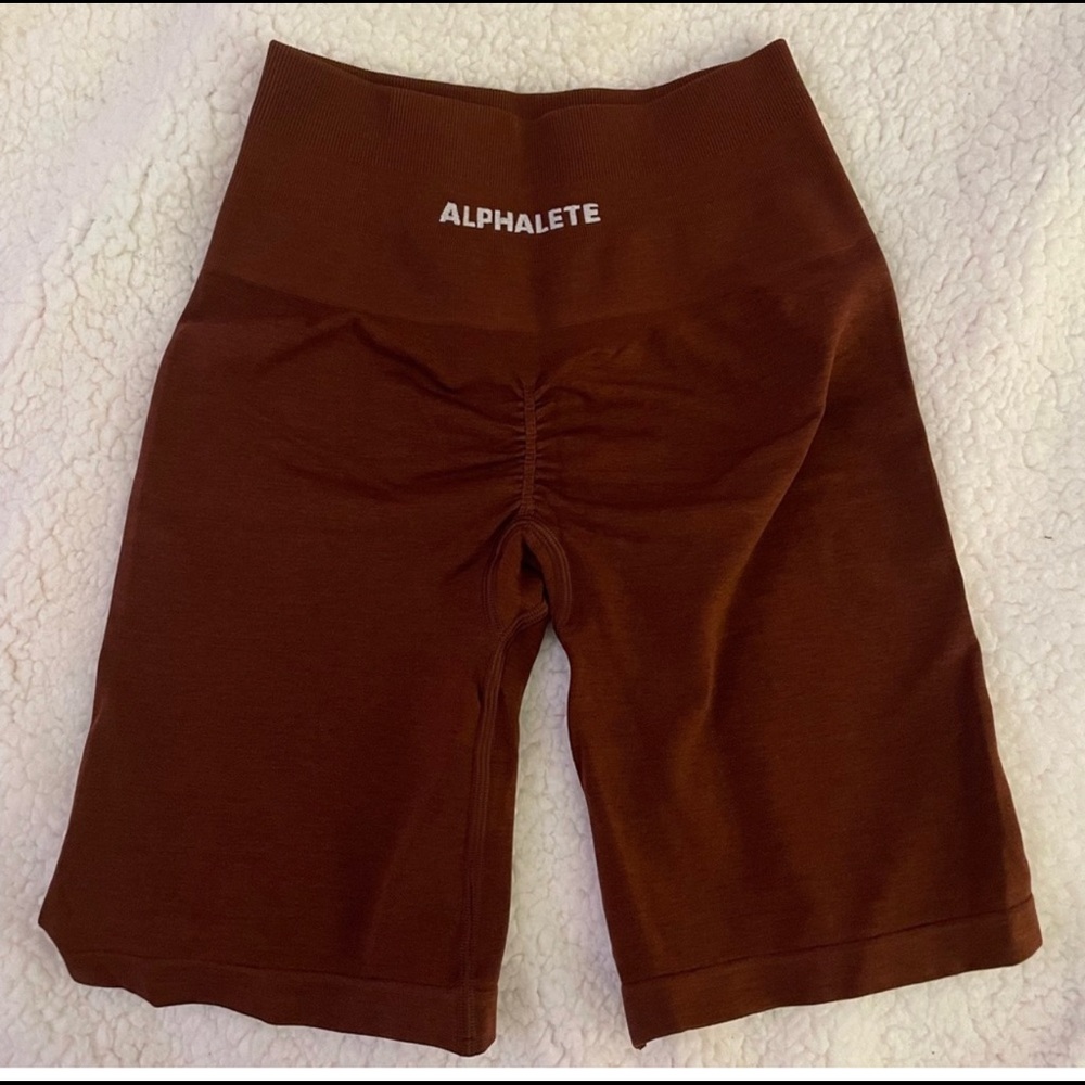 Alphalete amplify copper biker shorts